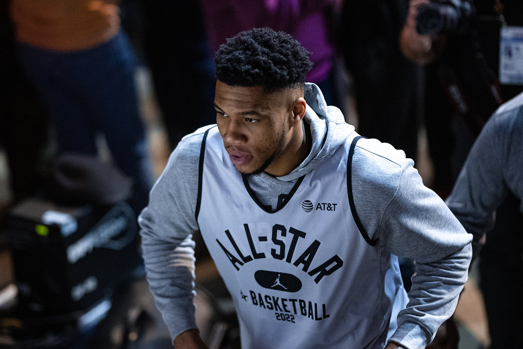 Giannis Antetokounmpo blocking a shot during a Milwaukee bucks game.